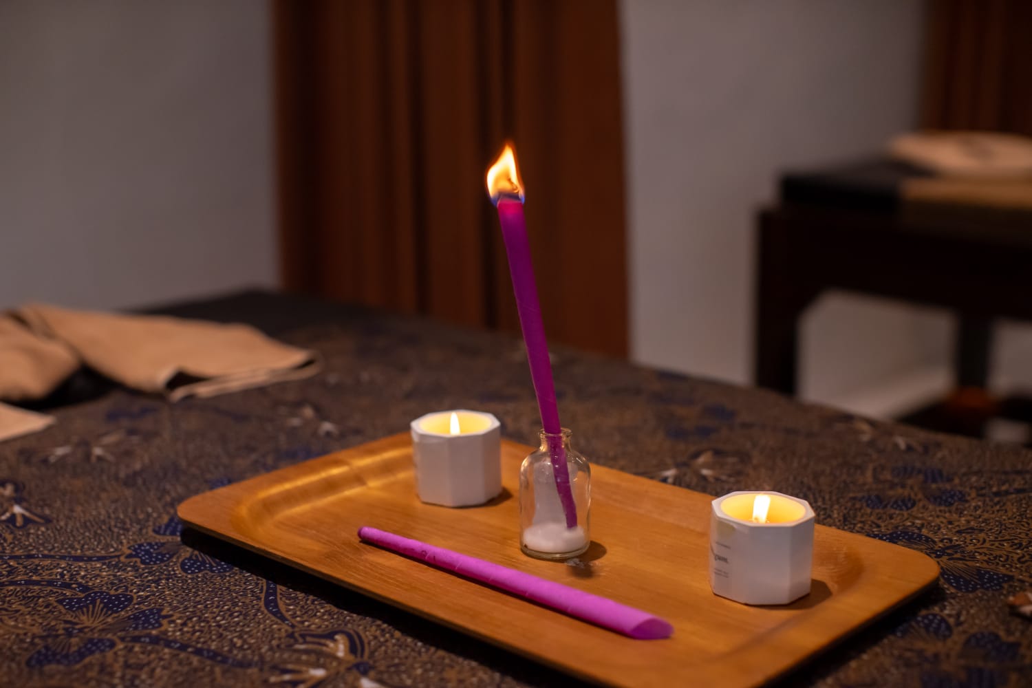 Incense and candles arranged for a spa ritual